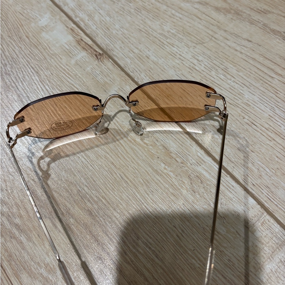 Le Specs pink lens frameless Sunglasses - Picture 3 of 4